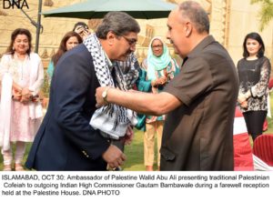 ISLAMABAD, OCT 30: Ambassador of Palestine Walid Abu Ali presenting traditional Palestinian  Cofeiah to outgoing Indian High Commissioner Gautam Bambawale during a farewell reception held at the Palestine House. DNA PHOTO