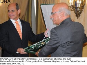 HAVANA, APR 28: Pakistans ambassador to Cuba Kamran Shafi handing over Nishan-e-Pakistan award to Cuban govt official. The award is given to fromer Cuban President Fidel Castro. DNA PHOTO