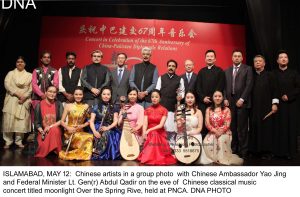 ISLAMABAD, MAY 12: Chinese artists in a group photo with Chinese Ambassador Yao Jing and Federal Minister Lt. Gen(r) Abdul Qadir on the eve of Chinese classical music concert titled moonlight Over the Spring Rive, held at PNCA. DNA PHOTO