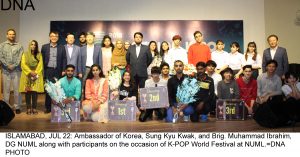 ISLAMABAD, JUL 22: Ambassador of Korea, Sung Kyu Kwak, and Brig. Muhammad Ibrahim, DG NUML along with participants on the occasion of K-POP World Festival at NUML.=DNA PHOTO