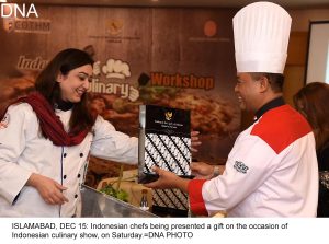 ISLAMABAD, DEC 15: Indonesian chefs being presented a gift on the occasion of Indonesian culinary show, on Saturday.=DNA PHOTO