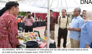 ISLAMABAD, APR 14: Ambassador of Indonesia and his wife taking interest various items at a stall during election bazaar event. DNA PHOTO