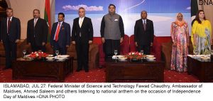 ISLAMABAD, JUL 27: Federal Minister of Science and Technology Fawad Chaudhry, Ambassador of Maldives, Ahmed Saleem and others listening to national anthem on the occasion of Independence Day of Maldives.=DNA PHOTO